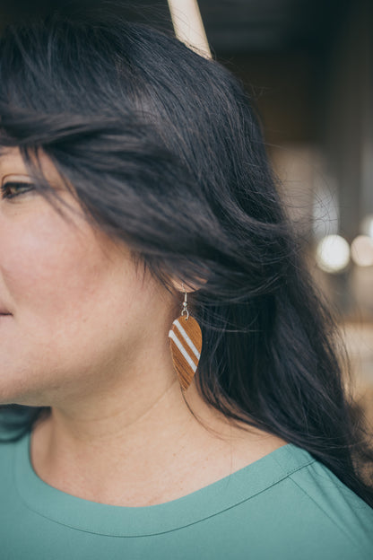 a woman in a green shirt and a black shirt 